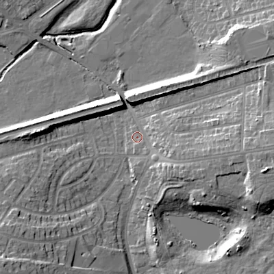 Shaded relief map of the ground around B712EG, computed from Environment Agency LiDAR. The ground here sits at about 120 m above sea level and falls 21 m across the surrounding 800 m. Surface water reaching this point runs off ground lying to the east, 10.6 m higher.