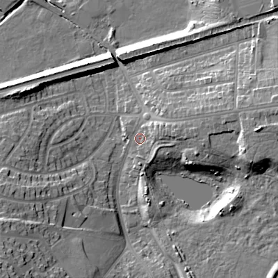 Shaded relief map of the ground around B712EU, computed from Environment Agency LiDAR. The ground here sits at about 121 m above sea level and falls 23 m across the surrounding 800 m. Surface water reaching this point runs off ground lying to the east-north-east, 9.9 m higher.