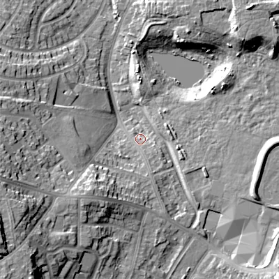 Shaded relief map of the ground around B712HG, computed from Environment Agency LiDAR. The ground here sits at about 121 m above sea level and falls 25 m across the surrounding 800 m. Surface water reaching this point runs off ground lying to the south-west, 11.9 m higher.