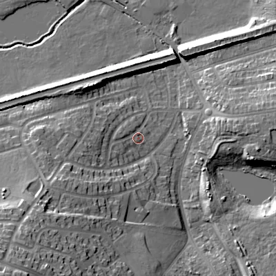 Shaded relief map of the ground around B712NS, computed from Environment Agency LiDAR. The ground here sits at about 121 m above sea level and falls 30 m across the surrounding 800 m. Surface water reaching this point runs off ground lying to the west-south-west, 6.2 m higher.