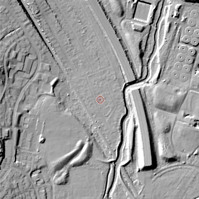 Shaded relief map of the ground around B713QJ, computed from Environment Agency LiDAR. The ground here sits at about 108 m above sea level and falls 20 m across the surrounding 800 m. Surface water reaching this point runs off ground lying to the east-north-east, 0.6 m higher.
