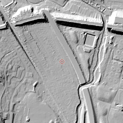 Shaded relief map of the ground around B713QS, computed from Environment Agency LiDAR. The ground here sits at about 109 m above sea level and falls 22 m across the surrounding 800 m. Surface water reaching this point runs off ground lying to the north-west, 16.9 m higher.