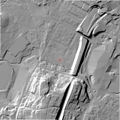 Shaded relief map of the ground around B736DX, computed from Environment Agency LiDAR. The ground here sits at about 110 m above sea level and falls 33 m across the surrounding 800 m. Surface water reaching this point runs off ground lying to the south-south-west, 30.5 m higher.