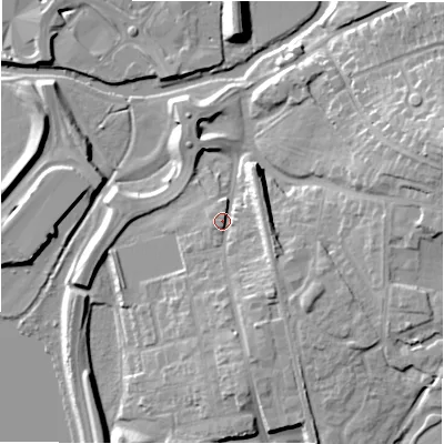 Shaded relief map of the ground around B771AA, computed from Environment Agency LiDAR. The ground here sits at about 64 m above sea level and falls 18 m across the surrounding 800 m. Surface water reaching this point runs off ground lying to the south-east, 6.8 m higher.