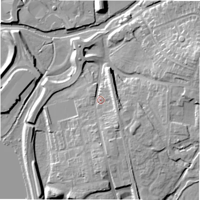 Shaded relief map of the ground around B771AB, computed from Environment Agency LiDAR. The ground here sits at about 64 m above sea level and falls 18 m across the surrounding 800 m. Surface water reaching this point runs off ground lying to the south-east, 6.2 m higher.