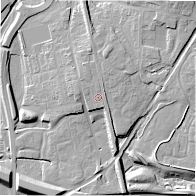 Shaded relief map of the ground around B771AG, computed from Environment Agency LiDAR. The ground here sits at about 69 m above sea level and falls 16 m across the surrounding 800 m. Surface water reaching this point runs off ground lying to the north-east, 1.0 m higher.