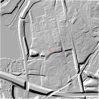 Shaded relief map of the ground around B771AU, computed from Environment Agency LiDAR. The ground here sits at about 65 m above sea level and falls 14 m across the surrounding 800 m. Surface water reaching this point runs off ground lying to the north-east, 5.6 m higher.