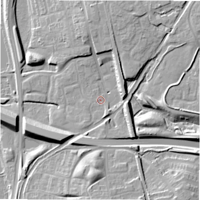 Shaded relief map of the ground around B771AX, computed from Environment Agency LiDAR. The ground here sits at about 63 m above sea level and falls 15 m across the surrounding 800 m. Surface water reaching this point runs off ground lying to the east-north-east, 8.3 m higher.