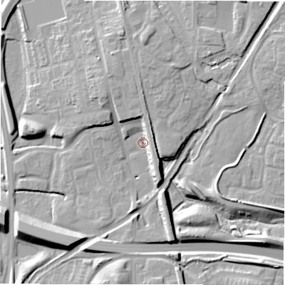 Shaded relief map of the ground around B771BB, computed from Environment Agency LiDAR. The ground here sits at about 63 m above sea level and falls 14 m across the surrounding 800 m. Surface water reaching this point runs off ground lying to the east-north-east, 8.9 m higher.