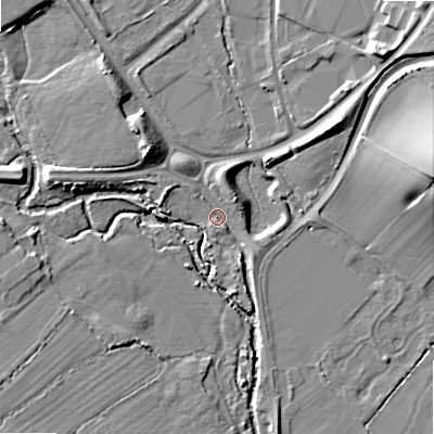 Shaded relief map of the ground around B807BD, computed from Environment Agency LiDAR. The ground here sits at about 65 m above sea level and falls 18 m across the surrounding 800 m. Surface water reaching this point runs off ground lying to the north-east, 9.8 m higher.