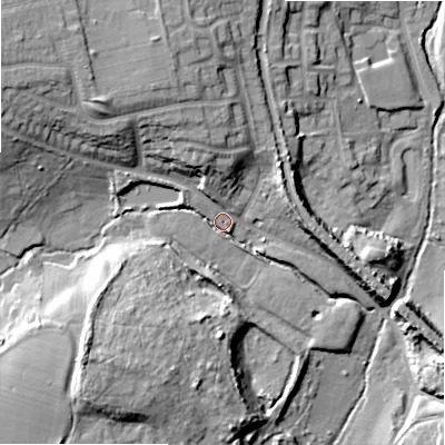 Shaded relief map of the ground around B901JG, computed from Environment Agency LiDAR. The ground here sits at about 133 m above sea level and falls 22 m across the surrounding 800 m. Surface water reaching this point runs off ground lying to the south-west, 17.8 m higher.