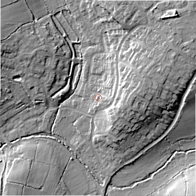 Shaded relief map of the ground around B904HN, computed from Environment Agency LiDAR. The ground here sits at about 129 m above sea level and falls 20 m across the surrounding 800 m. Surface water reaching this point runs off ground lying to the east, 6.3 m higher.