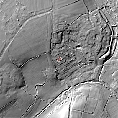 Shaded relief map of the ground around B904JE, computed from Environment Agency LiDAR. The ground here sits at about 134 m above sea level and falls 18 m across the surrounding 800 m. Surface water reaching this point runs off ground lying to the north-north-west, 2.3 m higher.