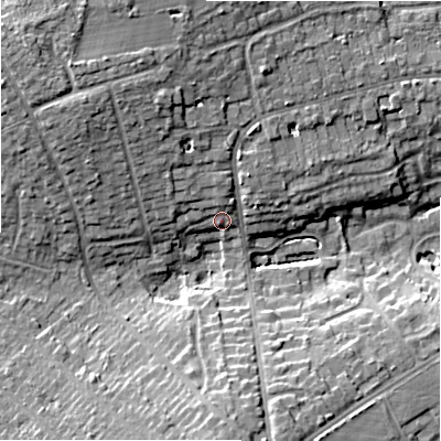 Shaded relief map of the ground around B911NR, computed from Environment Agency LiDAR. The ground here sits at about 132 m above sea level and falls 14 m across the surrounding 800 m. Surface water reaching this point runs off ground lying to the north-north-west, 1.4 m higher.
