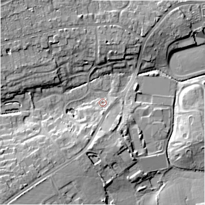 Shaded relief map of the ground around B911SR, computed from Environment Agency LiDAR. The ground here sits at about 127 m above sea level and falls 17 m across the surrounding 800 m. Surface water reaching this point runs off ground lying to the south, 3.7 m higher.
