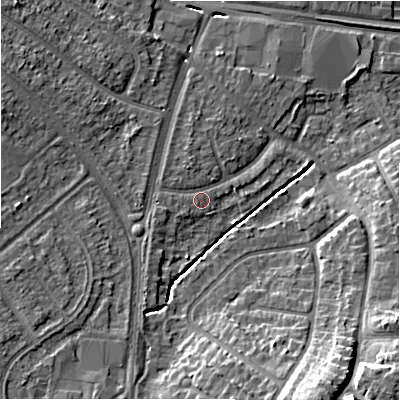 Shaded relief map of the ground around B928JQ, computed from Environment Agency LiDAR. The ground here sits at about 99 m above sea level and falls 15 m across the surrounding 800 m. Surface water reaching this point runs off ground lying to the west-north-west, 1.0 m higher.