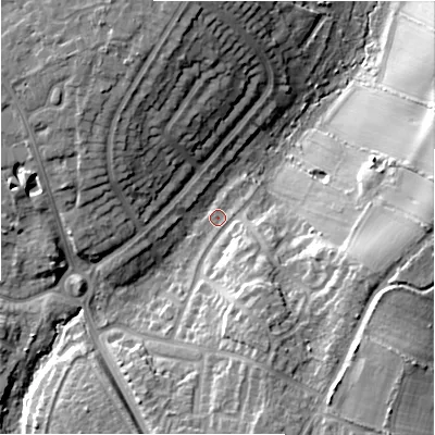 Shaded relief map of the ground around B939NX, computed from Environment Agency LiDAR. The ground here sits at about 112 m above sea level and falls 18 m across the surrounding 800 m. Surface water reaching this point runs off ground lying to the south-south-east, 11.7 m higher.