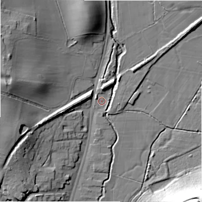 Shaded relief map of the ground around B955AD, computed from Environment Agency LiDAR. The ground here sits at about 74 m above sea level and falls 32 m across the surrounding 800 m. Surface water reaching this point runs off ground lying to the north-east, 7.6 m higher.