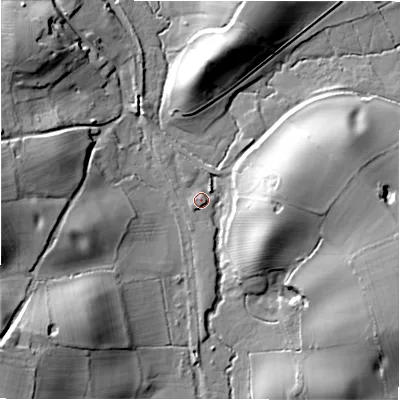 Shaded relief map of the ground around B955FZ, computed from Environment Agency LiDAR. The ground here sits at about 86 m above sea level and falls 25 m across the surrounding 800 m. Surface water reaching this point runs off ground lying to the north-east, 1.8 m higher.