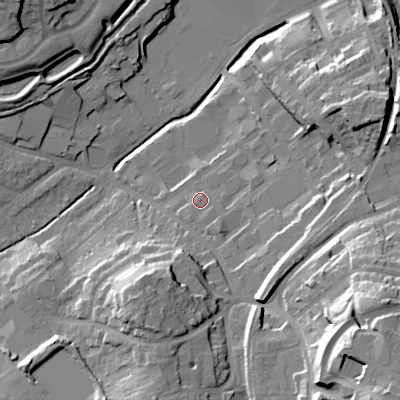 Shaded relief map of the ground around B976DL, computed from Environment Agency LiDAR. The ground here sits at about 100 m above sea level and falls 38 m across the surrounding 800 m. Surface water reaching this point runs off ground lying to the south-south-east, 2.5 m higher.