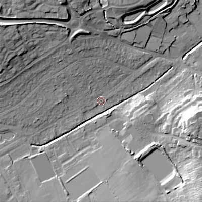 Shaded relief map of the ground around B976HZ, computed from Environment Agency LiDAR. The ground here sits at about 99 m above sea level and falls 30 m across the surrounding 800 m. Surface water reaching this point runs off ground lying to the west-north-west, 17.5 m higher.