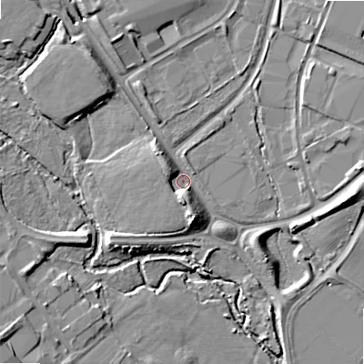 Shaded relief map of the ground around B980FE, computed from Environment Agency LiDAR. The ground here sits at about 67 m above sea level and falls 10 m across the surrounding 800 m. Surface water reaching this point runs off ground lying to the north-west, 7.3 m higher.