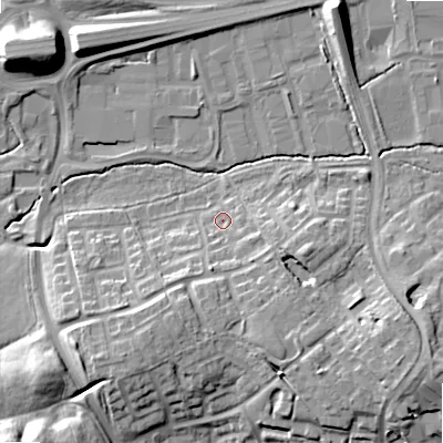 Shaded relief map of the ground around B980JQ, computed from Environment Agency LiDAR. The ground here sits at about 83 m above sea level and falls 15 m across the surrounding 800 m. Surface water reaching this point runs off ground lying to the south-south-east, 6.9 m higher.