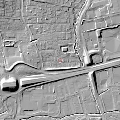Shaded relief map of the ground around B989JF, computed from Environment Agency LiDAR. The ground here sits at about 85 m above sea level and falls 15 m across the surrounding 800 m. Surface water reaching this point runs off ground lying to the north-north-west, 9.1 m higher.