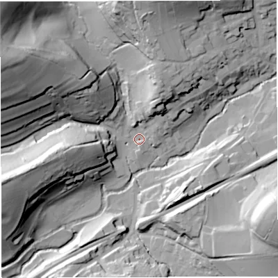 Shaded relief map of the ground around BA100AP, computed from Environment Agency LiDAR. The ground here sits at about 58 m above sea level and falls 63 m across the surrounding 800 m. Surface water reaching this point runs off ground lying to the west-north-west, 57.7 m higher.
