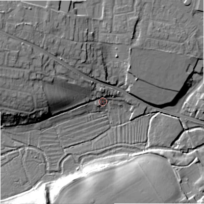 Shaded relief map of the ground around BA129HP, computed from Environment Agency LiDAR. The ground here sits at about 106 m above sea level and falls 21 m across the surrounding 800 m. Surface water reaching this point runs off ground lying to the north, 6.9 m higher.