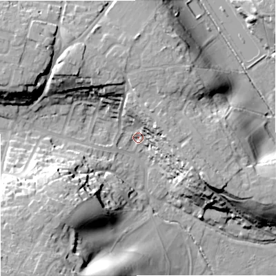 Shaded relief map of the ground around BA129PT, computed from Environment Agency LiDAR. The ground here sits at about 115 m above sea level and falls 34 m across the surrounding 800 m. Surface water reaching this point runs off ground lying to the north-east, 16.1 m higher.