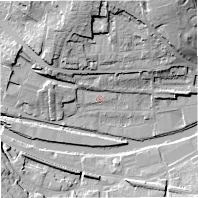 Shaded relief map of the ground around BA13EQ, computed from Environment Agency LiDAR. The ground here sits at about 21 m above sea level and falls 35 m across the surrounding 800 m. Surface water reaching this point runs off ground lying to the north-north-west, 3.2 m higher.