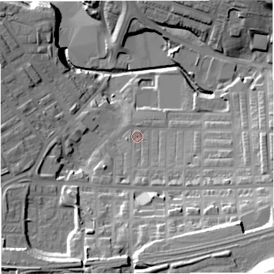 Shaded relief map of the ground around BB51SB, computed from Environment Agency LiDAR. The ground here sits at about 121 m above sea level and falls 43 m across the surrounding 800 m. Surface water reaching this point runs off ground lying to the south, 5.3 m higher.