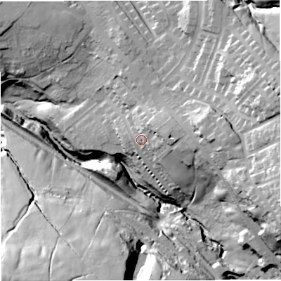 Shaded relief map of the ground around BB52XA, computed from Environment Agency LiDAR. The ground here sits at about 221 m above sea level and falls 67 m across the surrounding 800 m. Surface water reaching this point runs off ground lying to the east-north-east, 11.5 m higher.