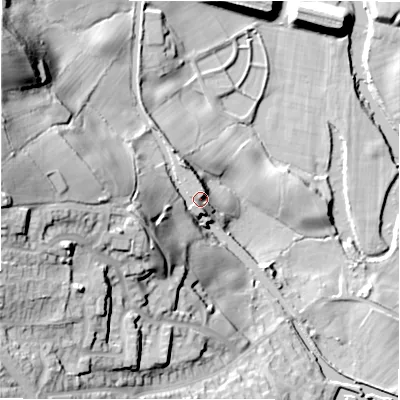 Shaded relief map of the ground around BD100PY, computed from Environment Agency LiDAR. The ground here sits at about 61 m above sea level and falls 53 m across the surrounding 800 m. Surface water reaching this point runs off ground lying to the west, 24.2 m higher.