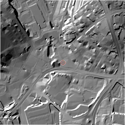 Shaded relief map of the ground around BD11JR, computed from Environment Agency LiDAR. The ground here sits at about 99 m above sea level and falls 42 m across the surrounding 800 m. Surface water reaching this point runs off ground lying to the west-south-west, 2.3 m higher.