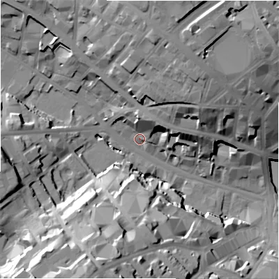 Shaded relief map of the ground around BD12NS, computed from Environment Agency LiDAR. The ground here sits at about 104 m above sea level and falls 35 m across the surrounding 800 m. Surface water reaching this point runs off ground lying to the north, 25.2 m higher.