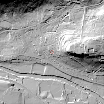 Shaded relief map of the ground around BD175JD, computed from Environment Agency LiDAR. The ground here sits at about 77 m above sea level and falls 65 m across the surrounding 800 m. Surface water reaching this point runs off ground lying to the east-north-east, 38.0 m higher.