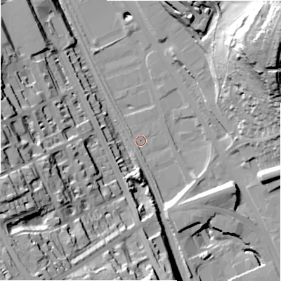 Shaded relief map of the ground around BD21QL, computed from Environment Agency LiDAR. The ground here sits at about 87 m above sea level and falls 52 m across the surrounding 800 m. Surface water reaching this point runs off ground lying to the south, 1.4 m higher.