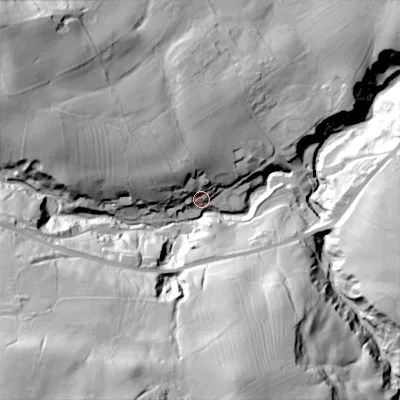 Shaded relief map of the ground around BD220DE, computed from Environment Agency LiDAR. The ground here sits at about 202 m above sea level and falls 92 m across the surrounding 800 m. Surface water reaching this point runs off ground lying to the north-west, 24.7 m higher.