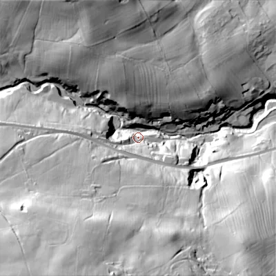 Shaded relief map of the ground around BD220DL, computed from Environment Agency LiDAR. The ground here sits at about 209 m above sea level and falls 89 m across the surrounding 800 m. Surface water reaching this point runs off ground lying to the south-south-west, 78.1 m higher.