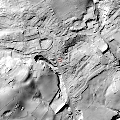 Shaded relief map of the ground around BD227QR, computed from Environment Agency LiDAR. The ground here sits at about 218 m above sea level and falls 107 m across the surrounding 800 m. Surface water reaching this point runs off ground lying to the north-north-west, 44.2 m higher.