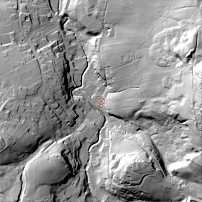 Shaded relief map of the ground around BD229HP, computed from Environment Agency LiDAR. The ground here sits at about 214 m above sea level and falls 101 m across the surrounding 800 m. Surface water reaching this point runs off ground lying to the east-north-east, 87.1 m higher.
