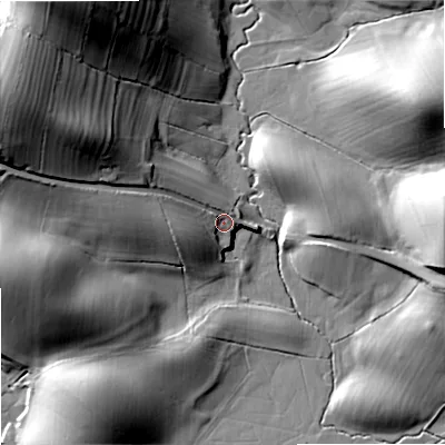 Shaded relief map of the ground around BD233JD, computed from Environment Agency LiDAR. The ground here sits at about 125 m above sea level and falls 44 m across the surrounding 800 m. Surface water reaching this point runs off ground lying to the west-north-west, 35.4 m higher.