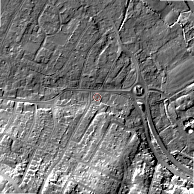 Shaded relief map of the ground around BH107AQ, computed from Environment Agency LiDAR. The ground here sits at about 10 m above sea level and falls 30 m across the surrounding 800 m. Surface water reaching this point runs off ground lying to the south-west, 25.5 m higher.