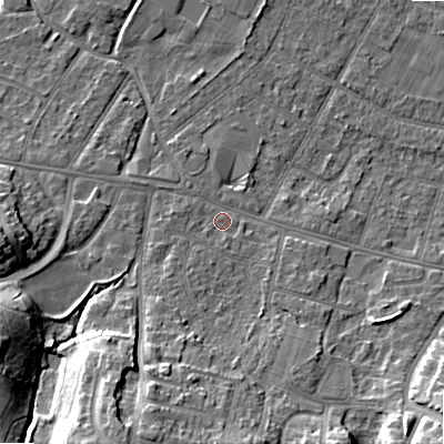 Shaded relief map of the ground around BH107AS, computed from Environment Agency LiDAR. The ground here sits at about 15 m above sea level and falls 16 m across the surrounding 800 m. Surface water reaching this point runs off ground lying to the south-south-west, 13.7 m higher.