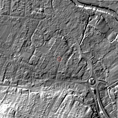 Shaded relief map of the ground around BH107EB, computed from Environment Agency LiDAR. The ground here sits at about 12 m above sea level and falls 19 m across the surrounding 800 m. Surface water reaching this point runs off ground lying to the west, 0.9 m higher.
