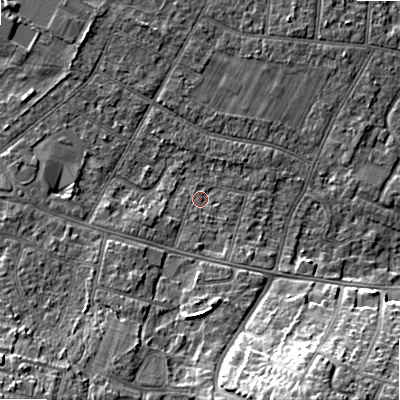 Shaded relief map of the ground around BH107JL, computed from Environment Agency LiDAR. The ground here sits at about 13 m above sea level and falls 17 m across the surrounding 800 m. Surface water reaching this point runs off ground lying to the south, 8.3 m higher.