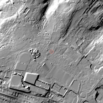 Shaded relief map of the ground around BH118TF, computed from Environment Agency LiDAR. The ground here sits at about 65 m above sea level and falls 21 m across the surrounding 800 m. Surface water reaching this point runs off ground lying to the west, 4.7 m higher.