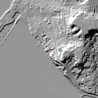 Shaded relief map of the ground around BH148HY, computed from Environment Agency LiDAR. The ground here sits at about 7 m above sea level and falls 38 m across the surrounding 800 m. Surface water reaching this point runs off ground lying to the east-north-east, 4.9 m higher.